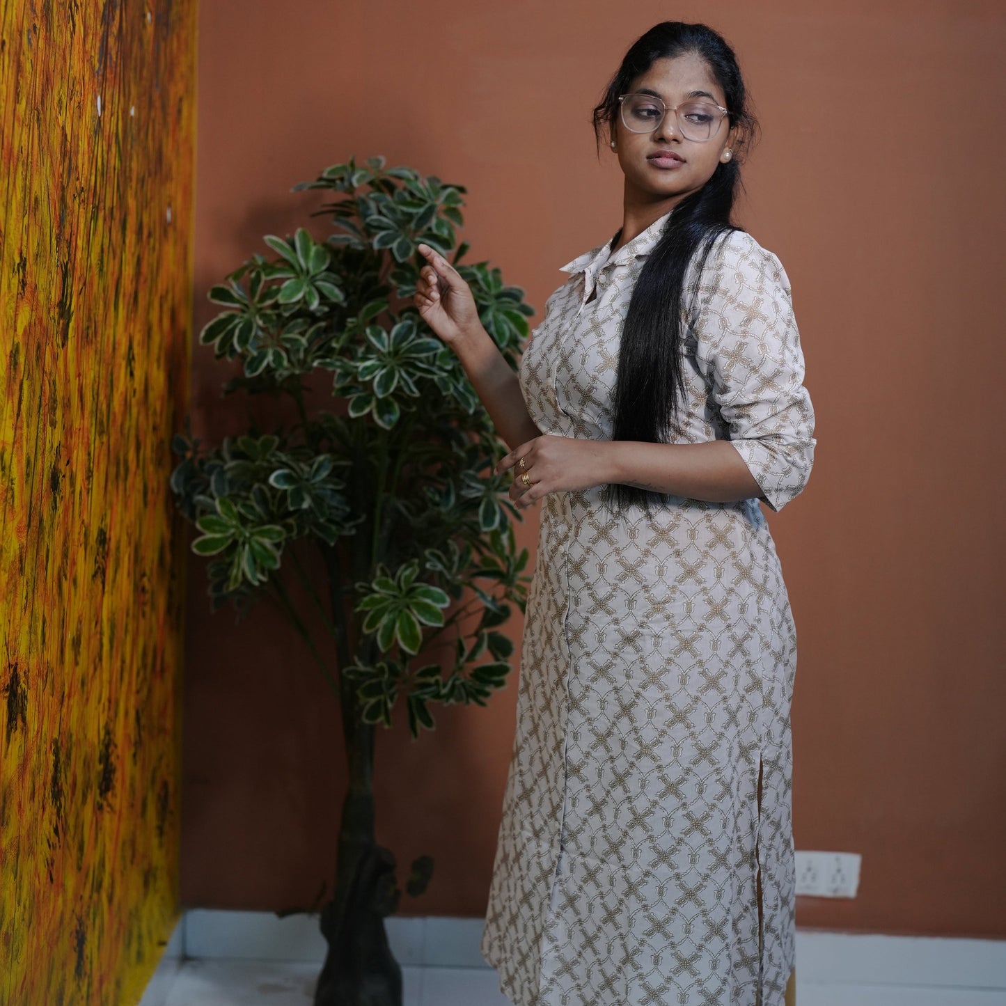 A-line cotton collared Kurti with side pocket best suited for Working Women.