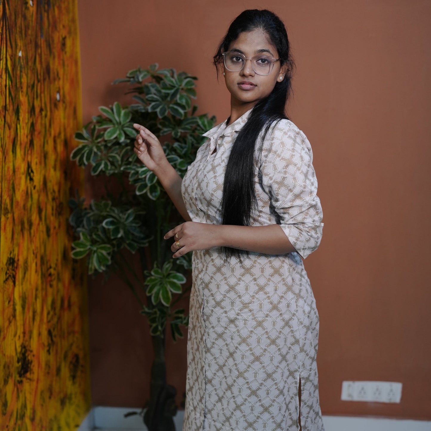 A-line cotton collared Kurti with side pocket best suited for Working Women.