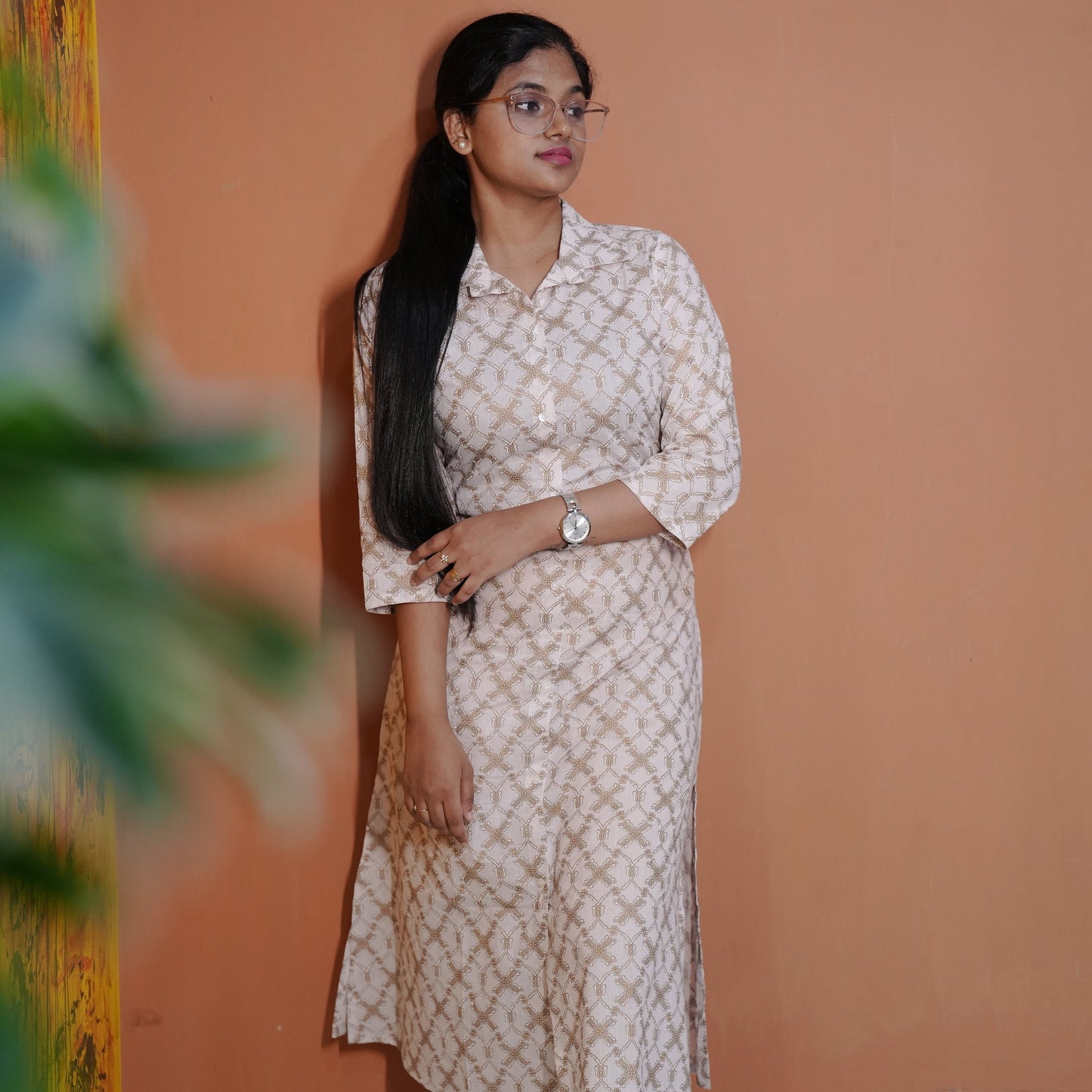 A-line cotton collared Kurti with side pocket best suited for Working Women.