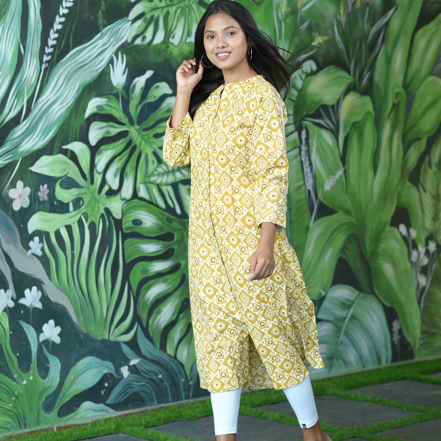A-line Mustard coloured Cotton Kurti with stylish lace sleeves.