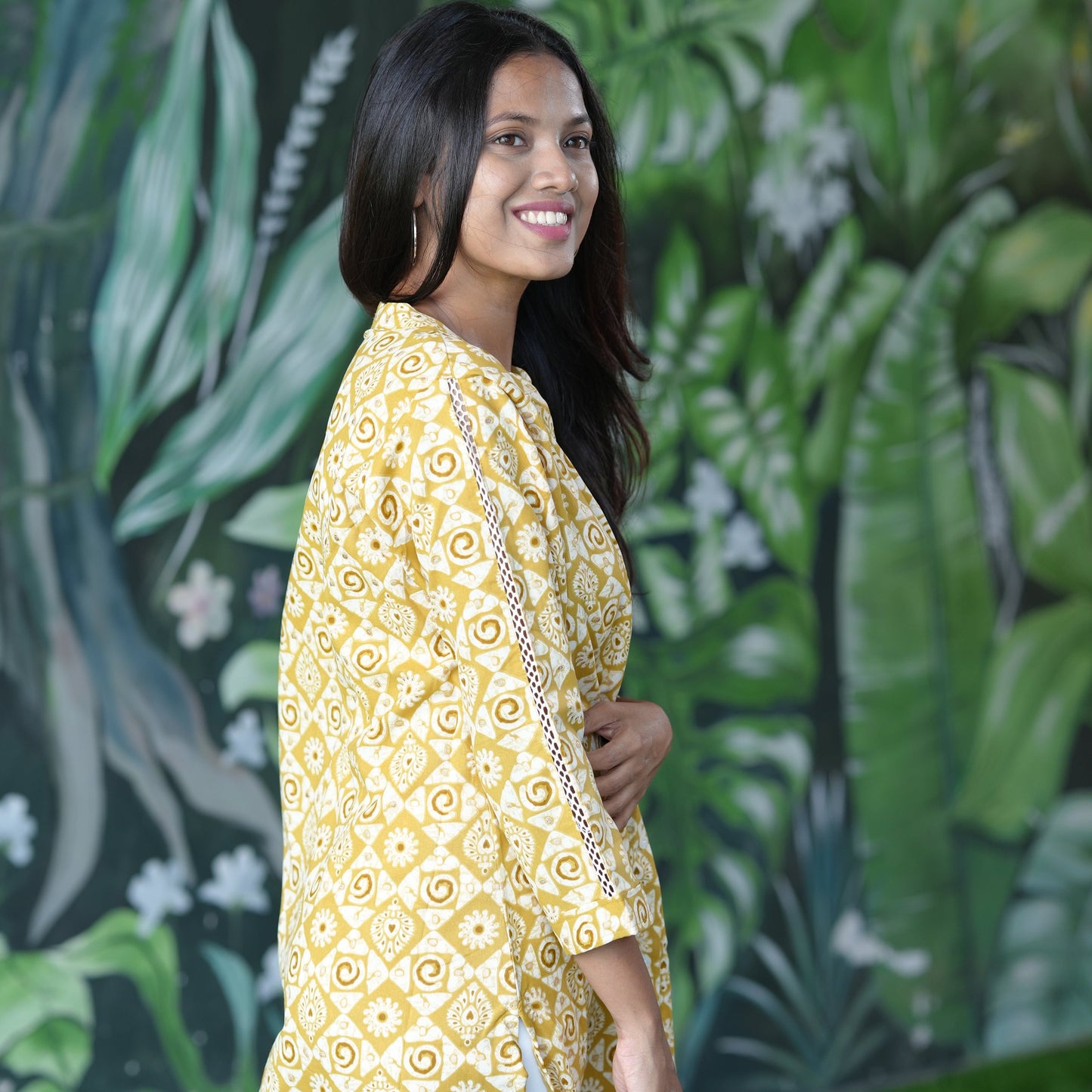 A-line Mustard coloured Cotton Kurti with stylish lace sleeves.