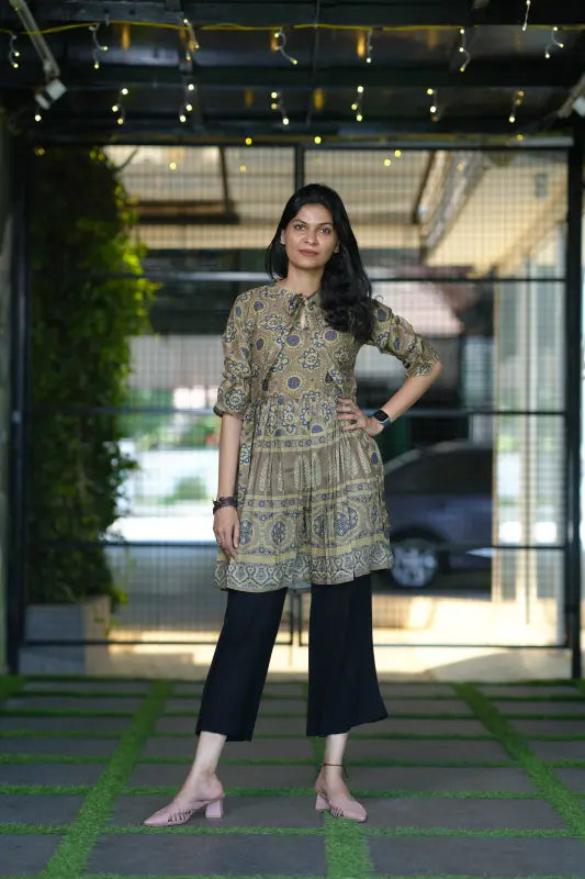 Classy army green colour short muslin silk kurti with stylish front tie detail.