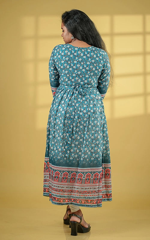 Deep teal color flared poly muslin kurti with mirror embellished yoke with back tie detail