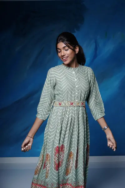 Lovely olive green rayon flared Kurti with embellished belt.