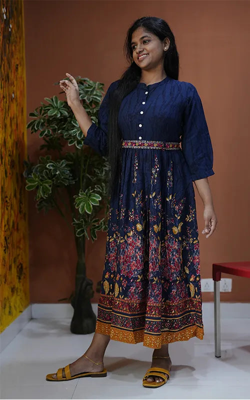 Flared navy blue dress style Kurti with embellished belt in rayon.