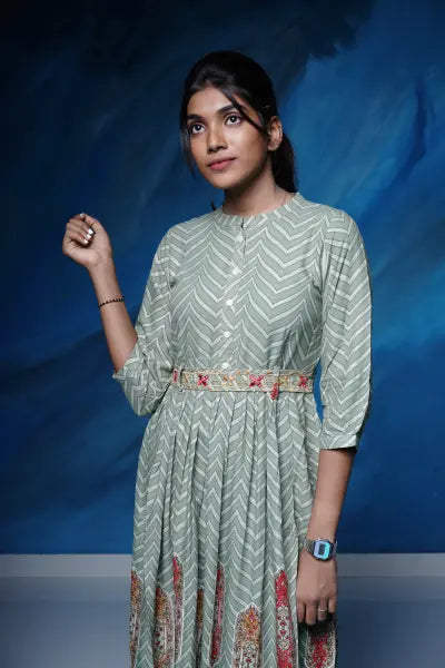 Lovely olive green rayon flared Kurti with embellished belt.