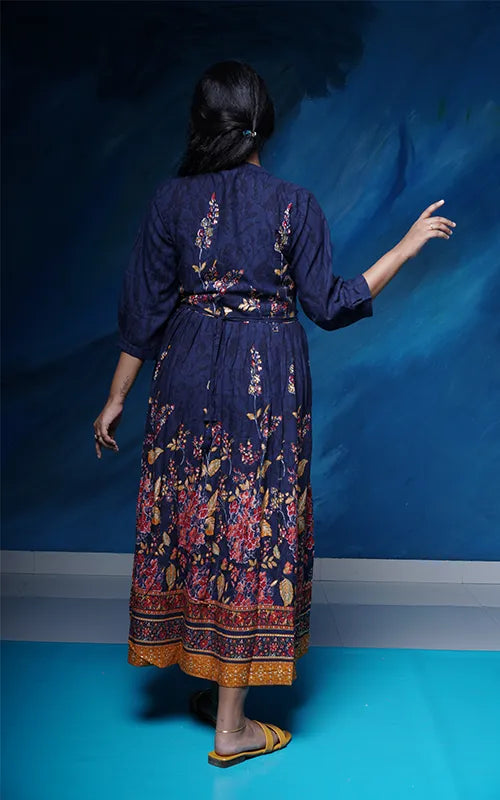 Flared navy blue dress style Kurti with embellished belt in rayon.