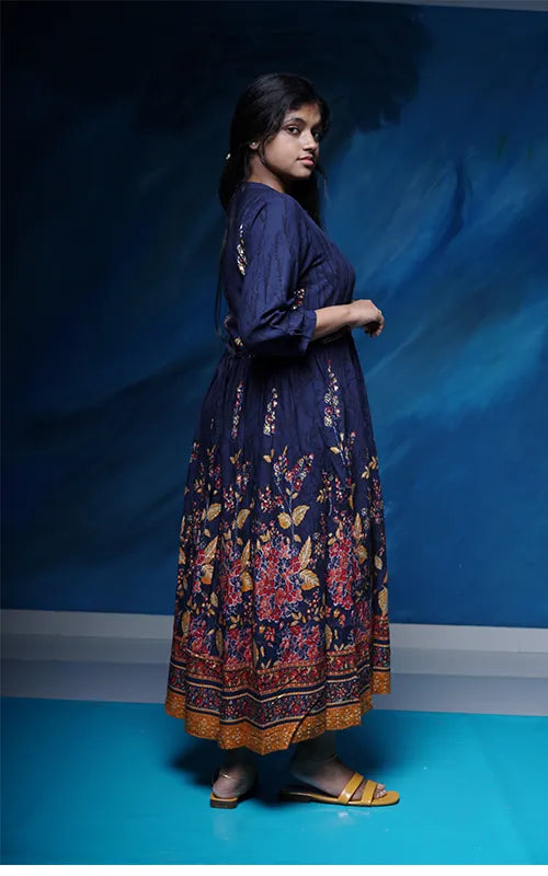 Flared navy blue dress style Kurti with embellished belt in rayon.