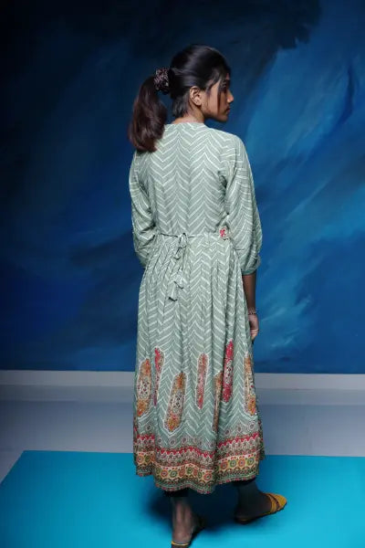 Lovely olive green rayon flared Kurti with embellished belt.