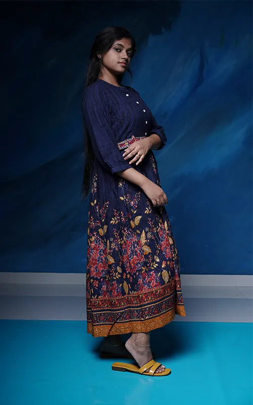 Flared navy blue dress style Kurti with embellished belt in rayon.