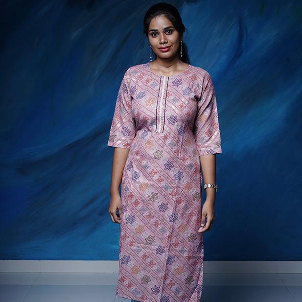 Pink pearl colour cotton Kurti with rich golden print work.