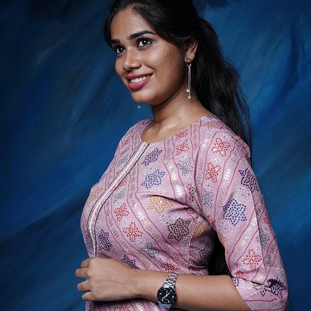 Pink pearl colour cotton Kurti with rich golden print work.