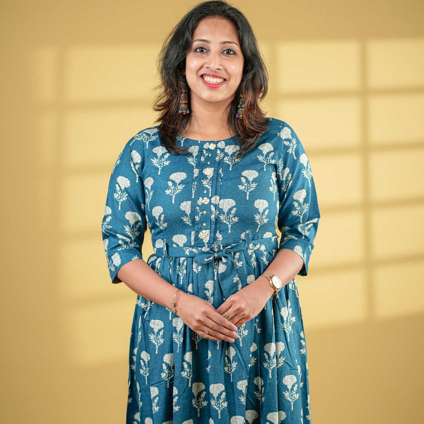 Deep turquoise coloured flared cotton Kurti with belt.