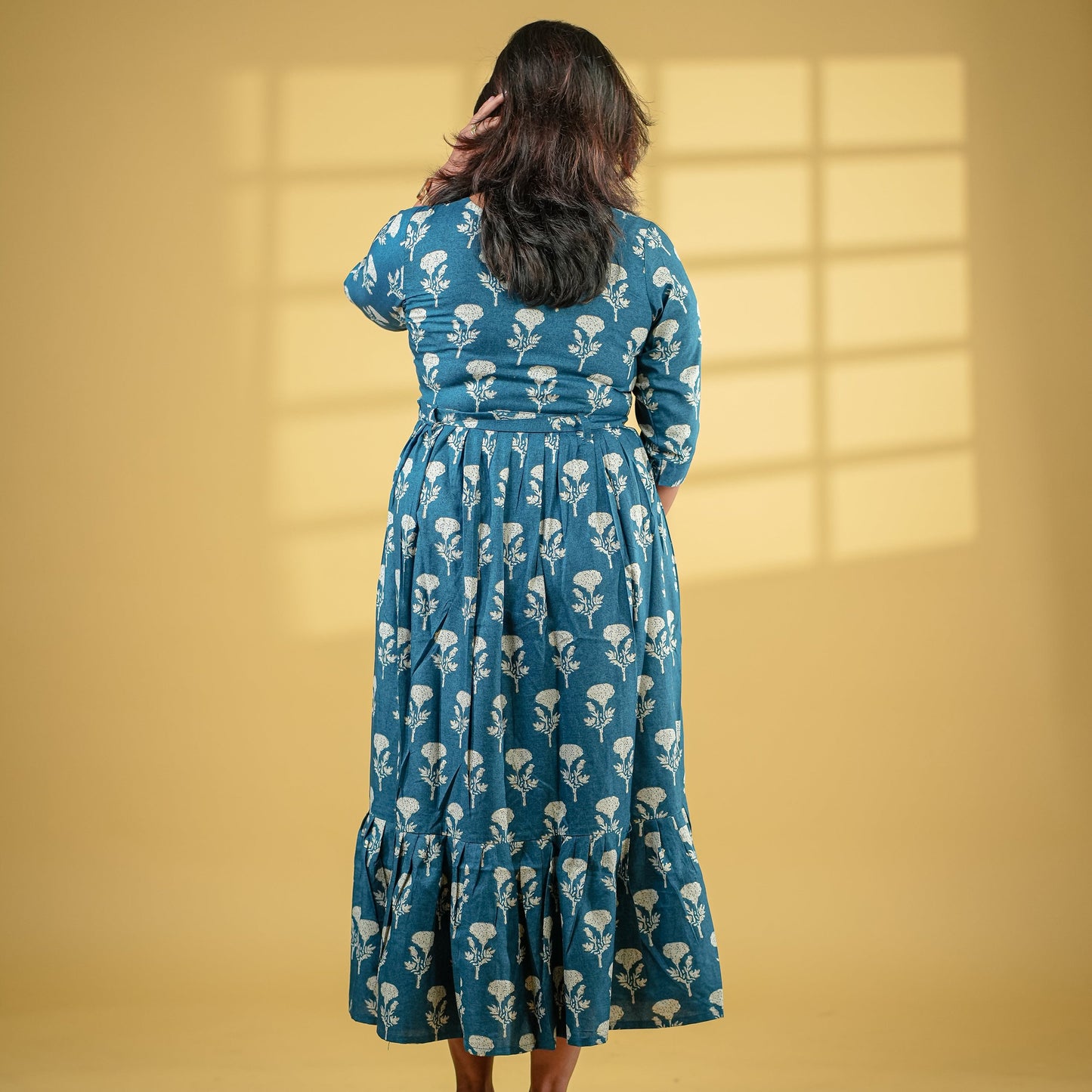 Deep turquoise coloured flared cotton Kurti with belt.
