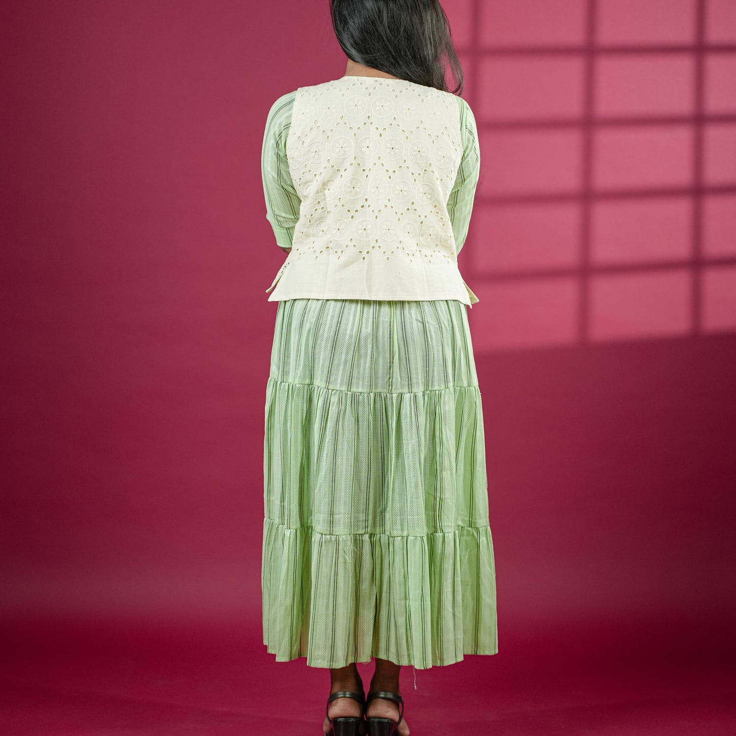 Beautiful flared light green cotton Kurti with off white jacket.