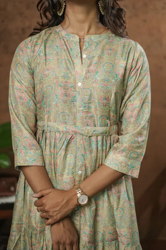 Beautiful and rich mint pastel green colour muslin silk flared Kurti with belt.