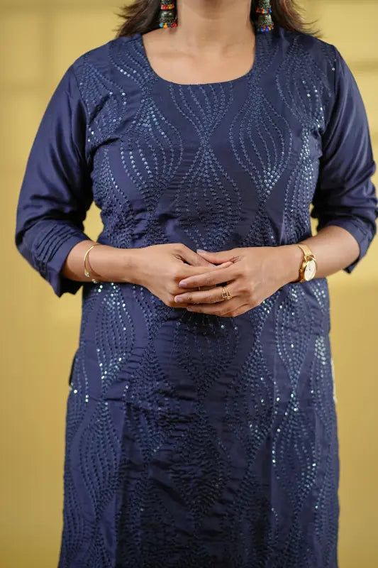 Navy blue sequin work muslin silk Kurti with bright orange digital print Dupatta.