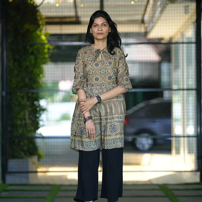 Classy army green colour short muslin silk kurti with stylish front tie detail.
