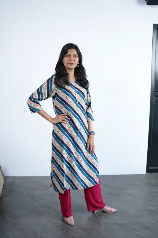 Simple straight cut tan coloured viscose rayon Kurti with turquoise green stripes and golden print work.