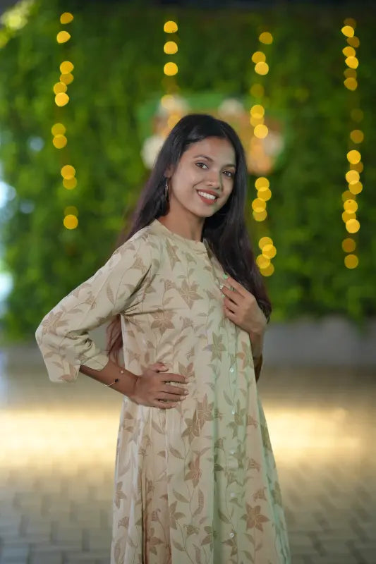Simple beige color mandarin collared a line kurti.