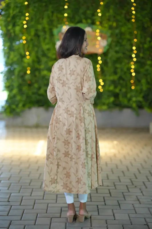 Simple beige color mandarin collared a line kurti.