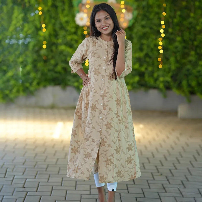 Simple beige color mandarin collared a line kurti.