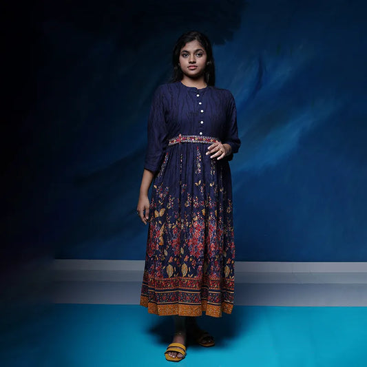 Flared navy blue dress style Kurti with embellished belt in rayon.