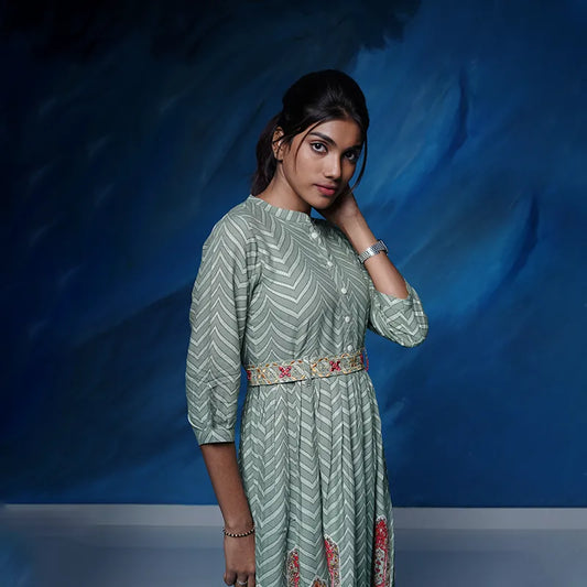 Lovely olive green rayon flared Kurti with embellished belt.