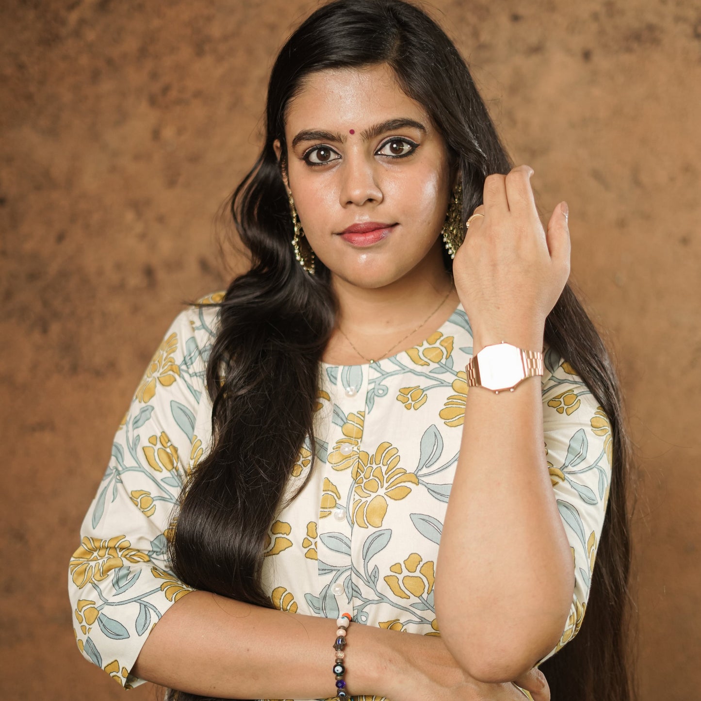 Simple off white cotton Kurtis with floral print.