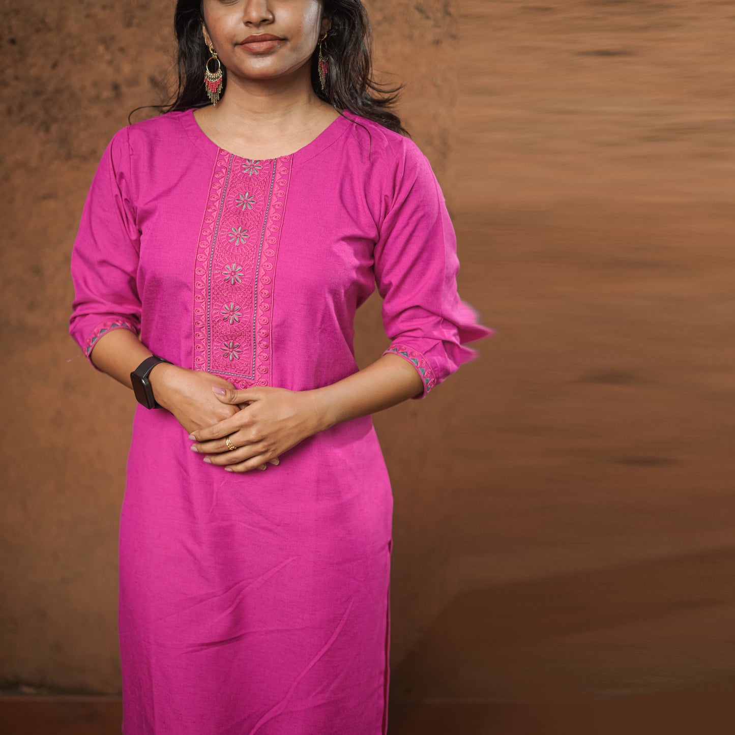 Bright fuschia coloured straight cut simple Cotton Kurti.