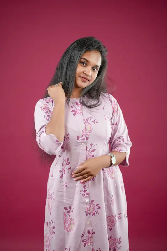 Beautiful lavender coloured mandarin collar a line Rayon Kurti.