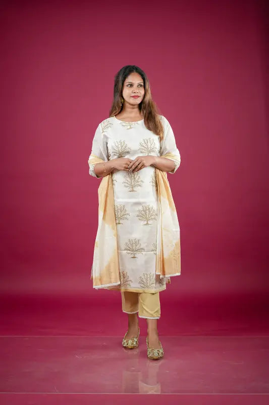 Beautiful and rich white and golden silk Kurti with rich golden thread work and golden tie dye Dupatta and rich golden stylish pant.