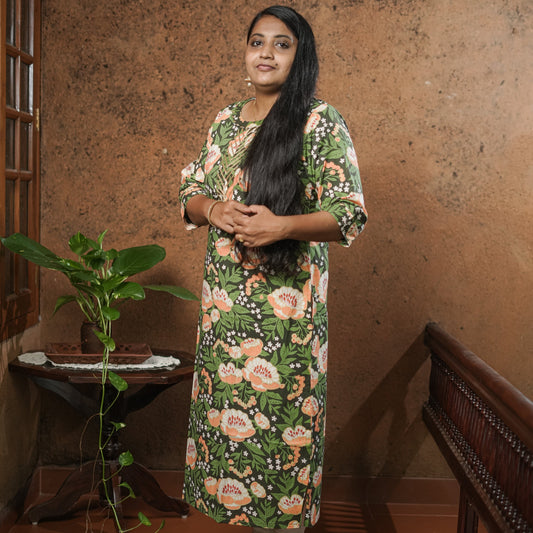 Straight cut simple pure cotton dark green Kurti with peach coloured floral print.