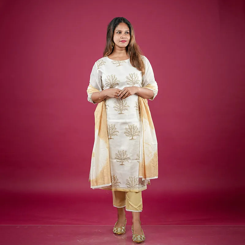 Beautiful and rich white and golden silk Kurti with rich golden thread work and golden tie dye Dupatta and rich golden stylish pant.