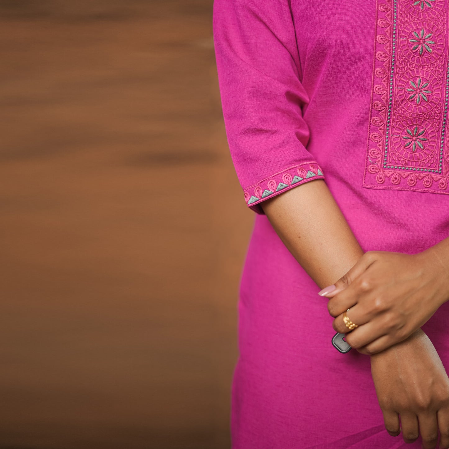 Bright fuschia coloured straight cut simple Cotton Kurti.
